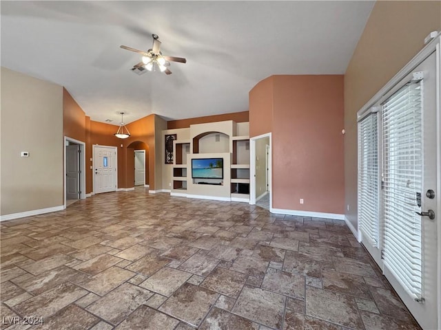 unfurnished living room with ceiling fan