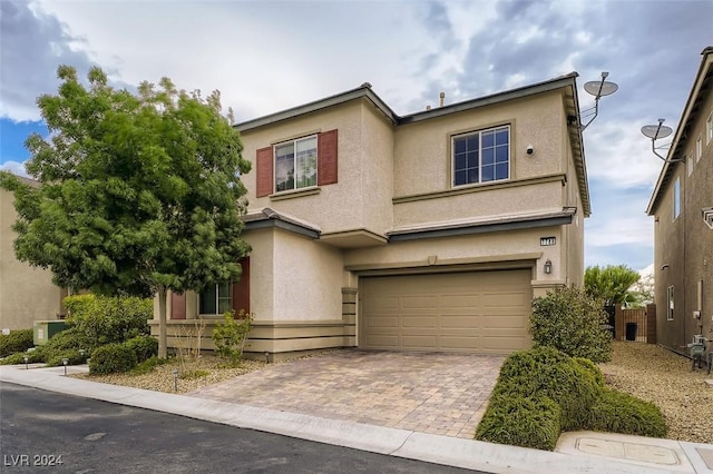 view of front of home with a garage