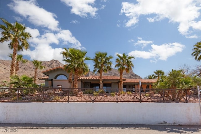 mediterranean / spanish-style home featuring a mountain view