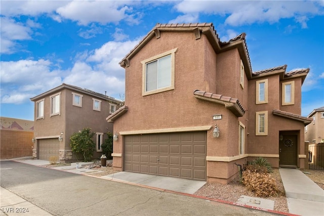 view of front of property featuring a garage