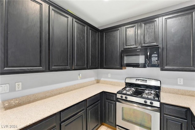 kitchen with stainless steel range with gas stovetop