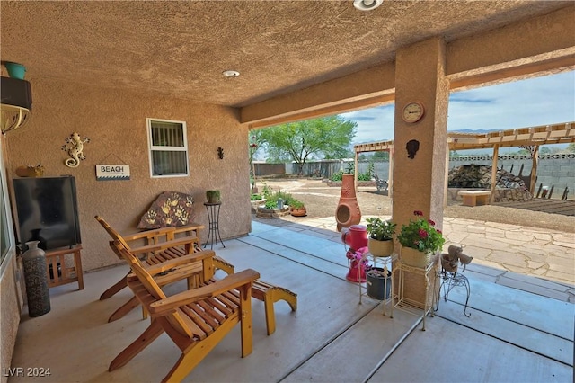 view of patio featuring a pergola