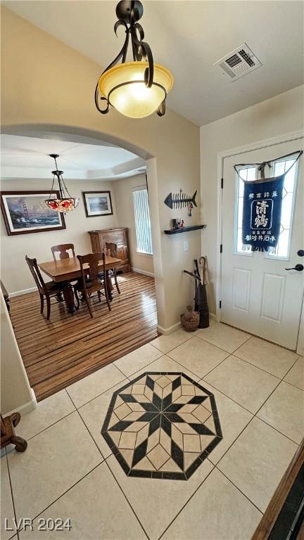 entryway with tile patterned floors