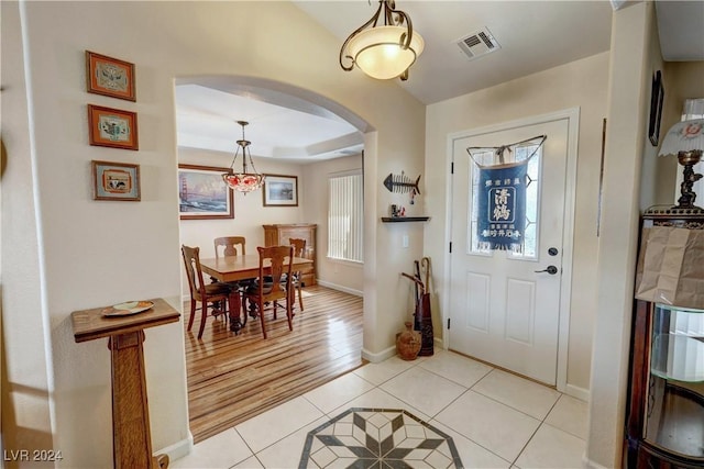 view of tiled foyer entrance