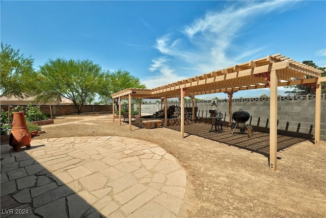 view of patio / terrace featuring a pergola and grilling area