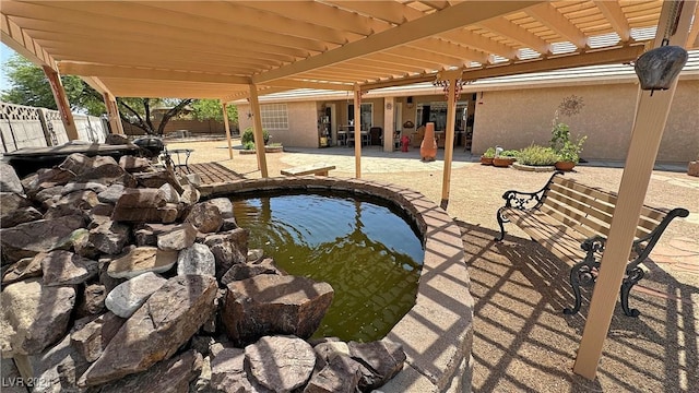 view of swimming pool with a patio area and a pergola