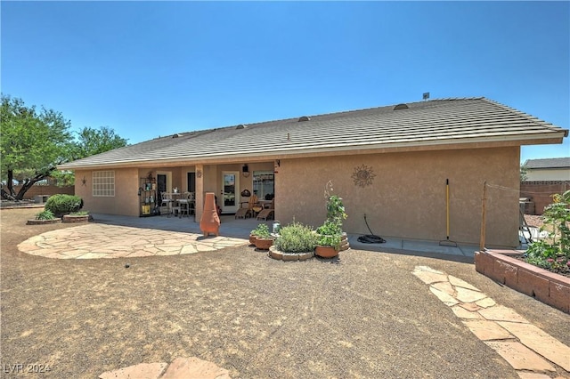 back of house featuring a patio