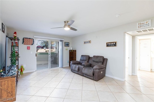 living room with ceiling fan and light tile patterned floors