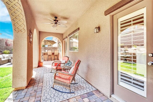 view of patio with ceiling fan