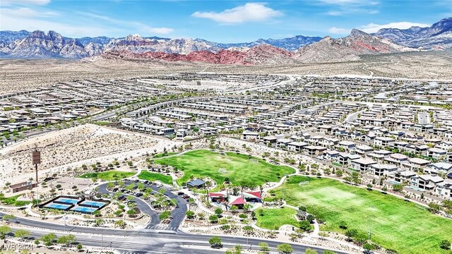 drone / aerial view featuring a mountain view