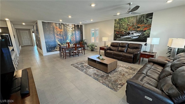 tiled living room featuring ceiling fan