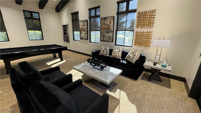 living room with vaulted ceiling with beams, light carpet, and billiards