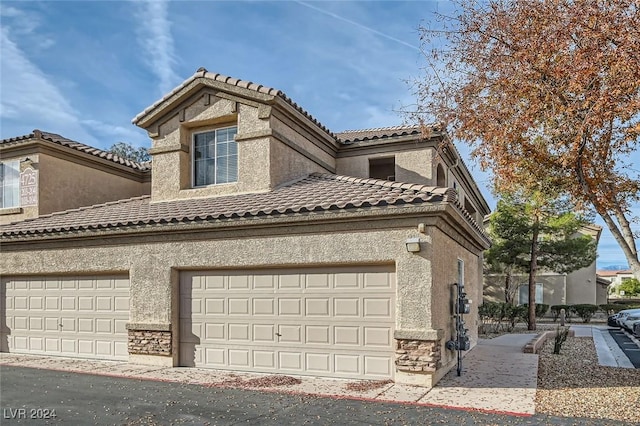 view of home's exterior featuring a garage