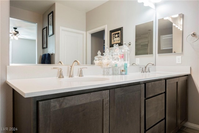 bathroom featuring ceiling fan and vanity