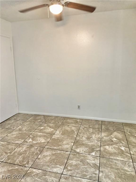 empty room with ceiling fan