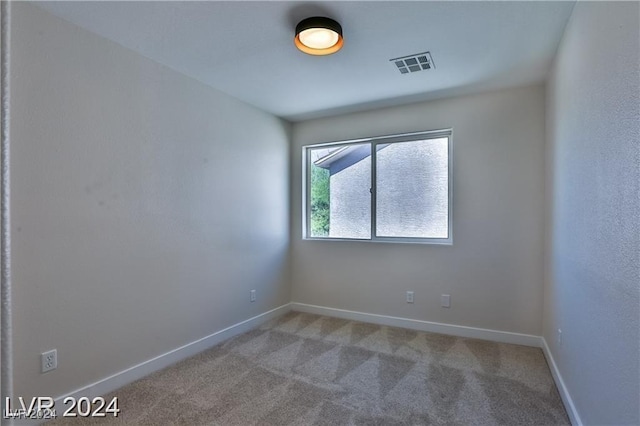 view of carpeted spare room