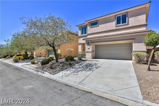 view of property featuring a garage