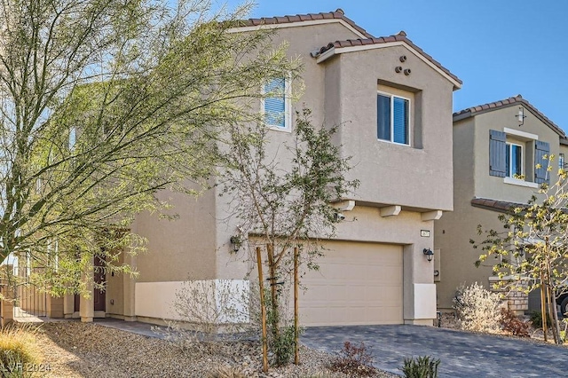 view of front of property featuring a garage