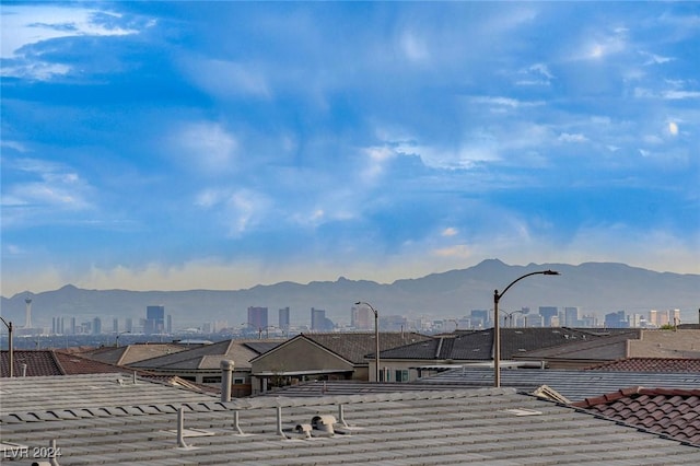 property view of mountains featuring a city view