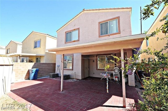 rear view of property with a patio