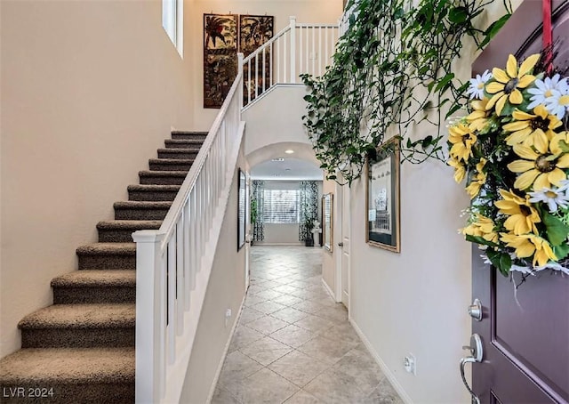 entrance foyer featuring light tile patterned floors