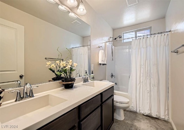 full bathroom with shower / bath combination with curtain, toilet, and vanity