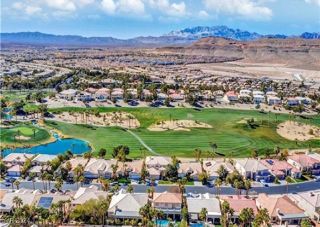 bird's eye view with a water and mountain view