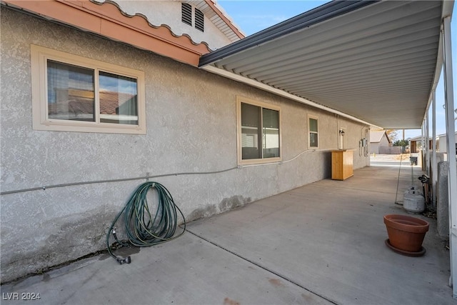 view of home's exterior with a patio area