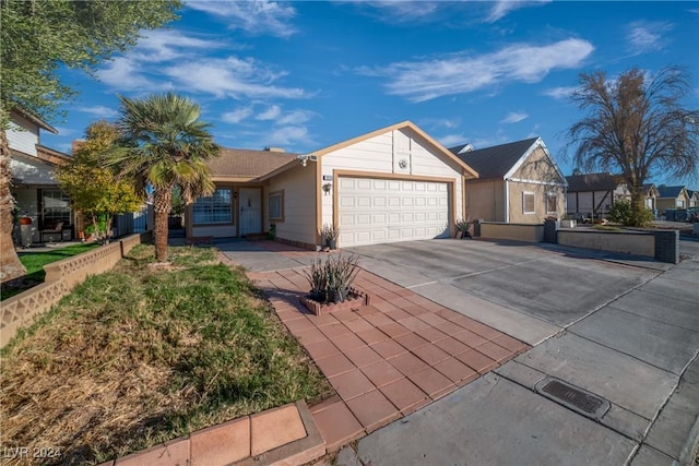 ranch-style house featuring a garage