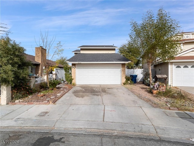 front facade with a garage