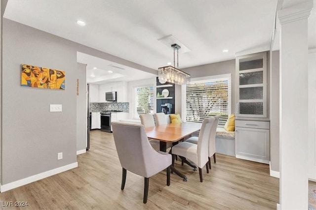 dining room featuring light hardwood / wood-style floors