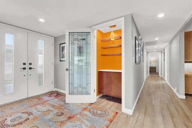 foyer featuring light hardwood / wood-style flooring