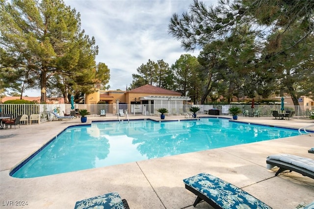 view of pool featuring a patio