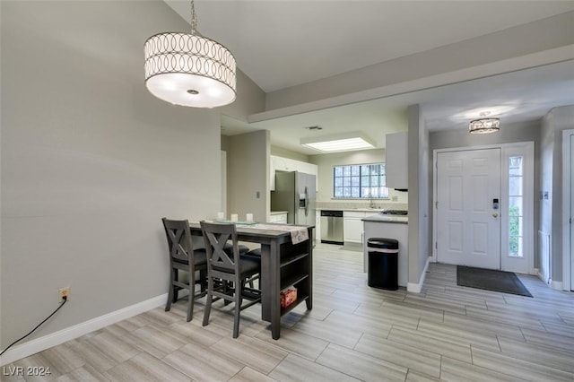 dining room featuring sink