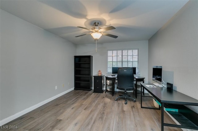 office area with ceiling fan and light wood-type flooring