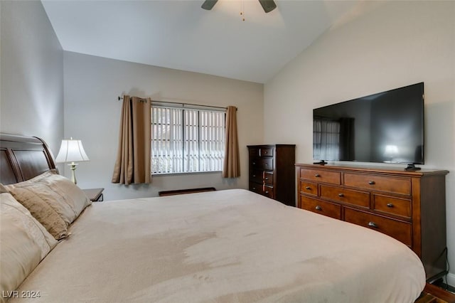 bedroom featuring ceiling fan and lofted ceiling