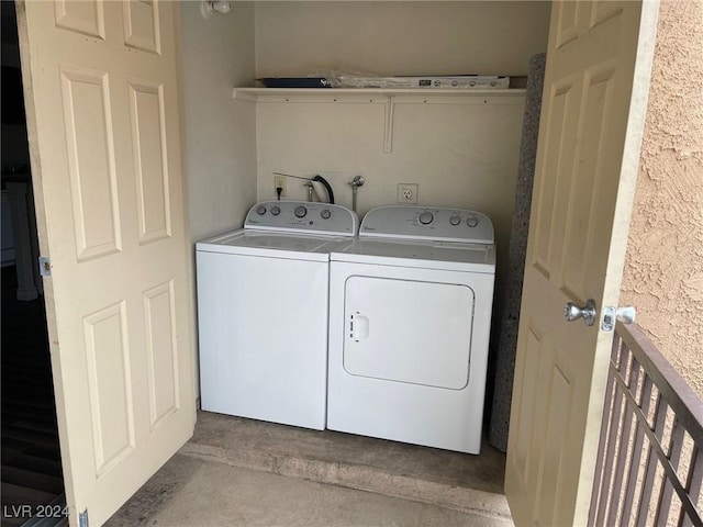 washroom with independent washer and dryer