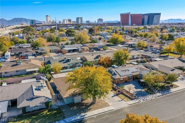 birds eye view of property featuring a mountain view