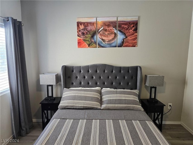 bedroom featuring hardwood / wood-style flooring