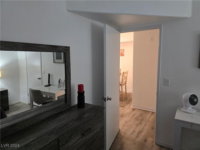 bathroom with wood-type flooring