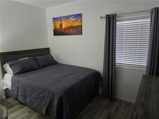 bedroom featuring wood-type flooring