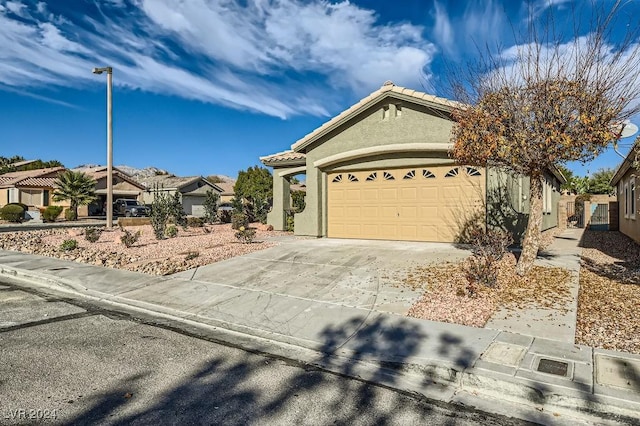 single story home with a garage