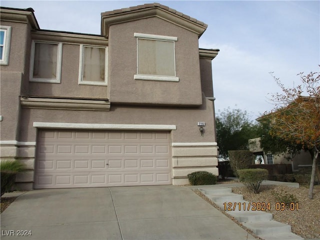 view of front of house with a garage