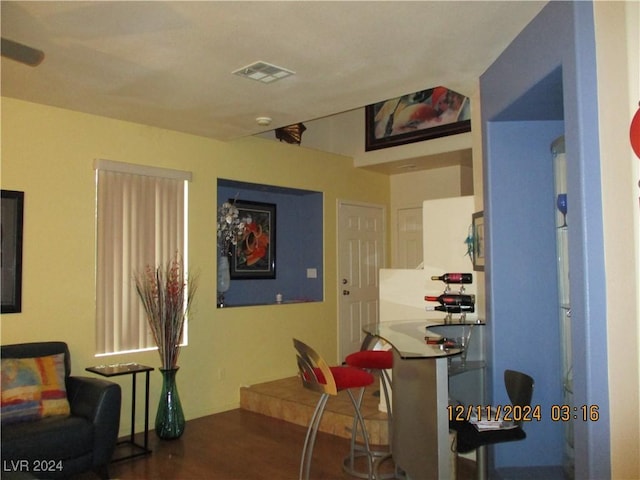 dining space featuring dark hardwood / wood-style flooring