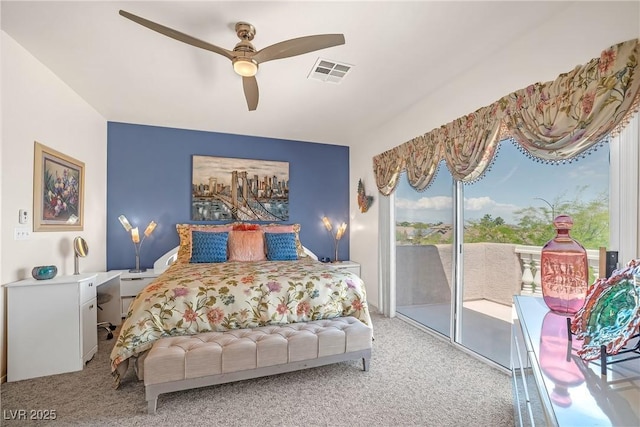 bedroom featuring light colored carpet, a ceiling fan, visible vents, and access to exterior