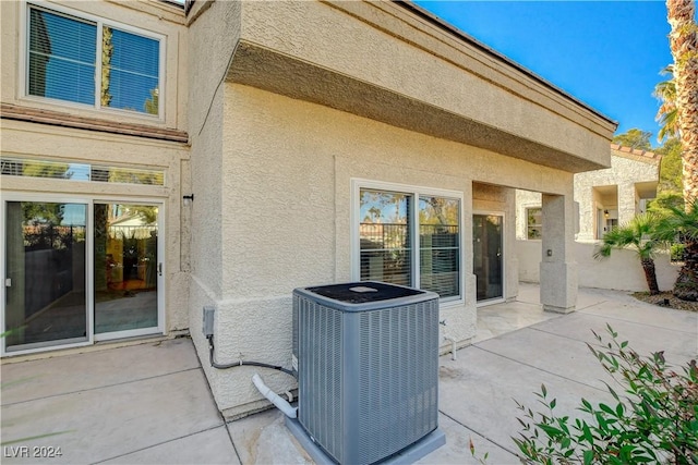 view of patio / terrace with central AC unit