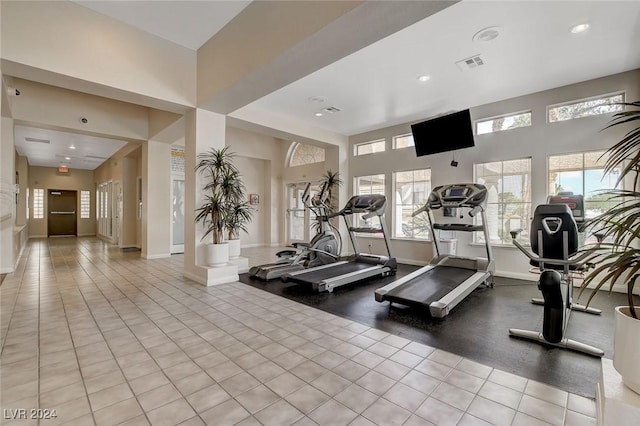 gym with light tile patterned floors