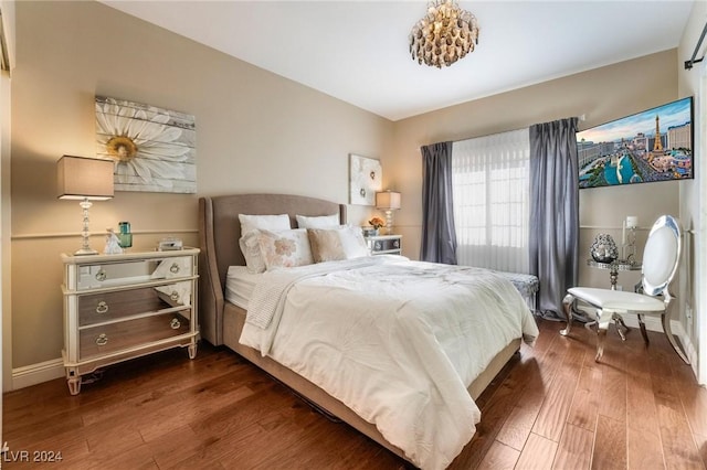 bedroom featuring dark wood-type flooring