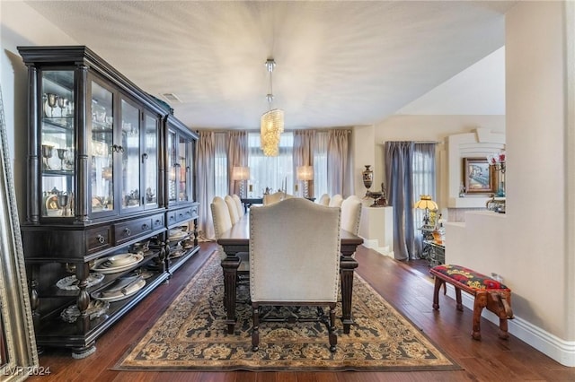 dining area featuring dark hardwood / wood-style flooring