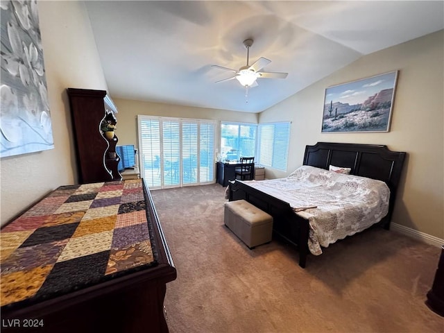 carpeted bedroom featuring vaulted ceiling and ceiling fan